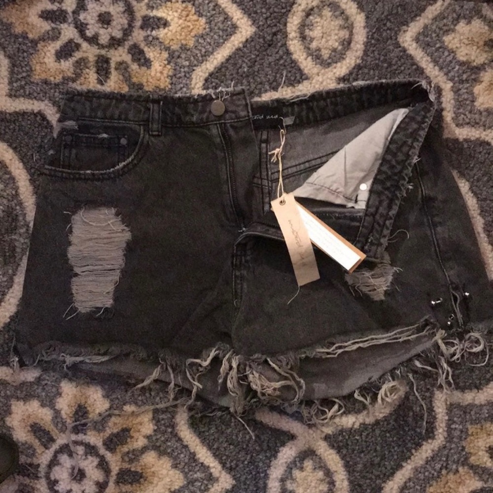 Distressed black denim shorts